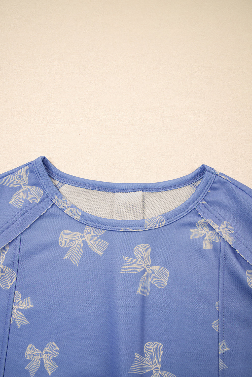 Mini-robe droite bleu ciel à imprimé nœud papillon et manches à volants