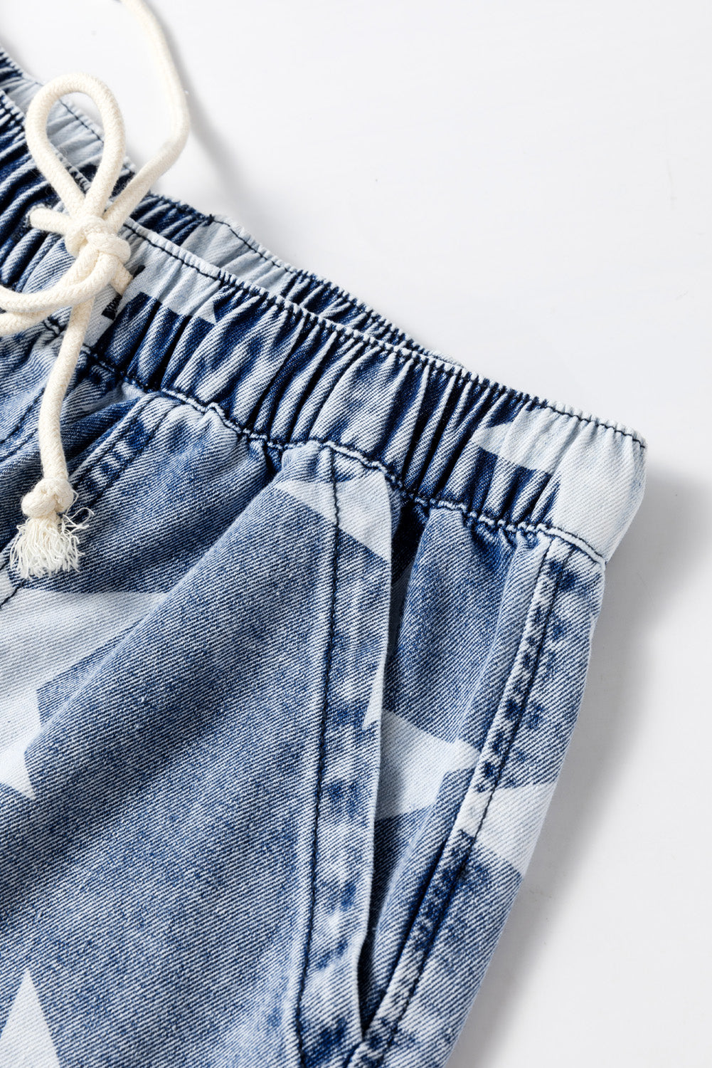 Jean large bleu clair à motif étoile délavé avec cordon de serrage et taille élastique