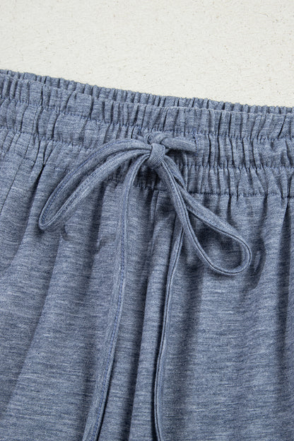 Pantalon ample à taille élastique avec cordon de serrage et détails froncés