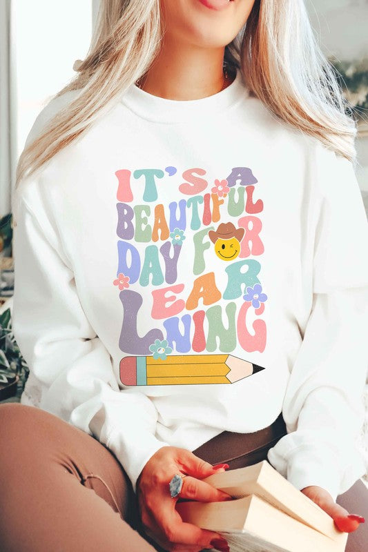 IT'S A BEAUTIFUL DAY FOR LEARNING Graphic Crewneck