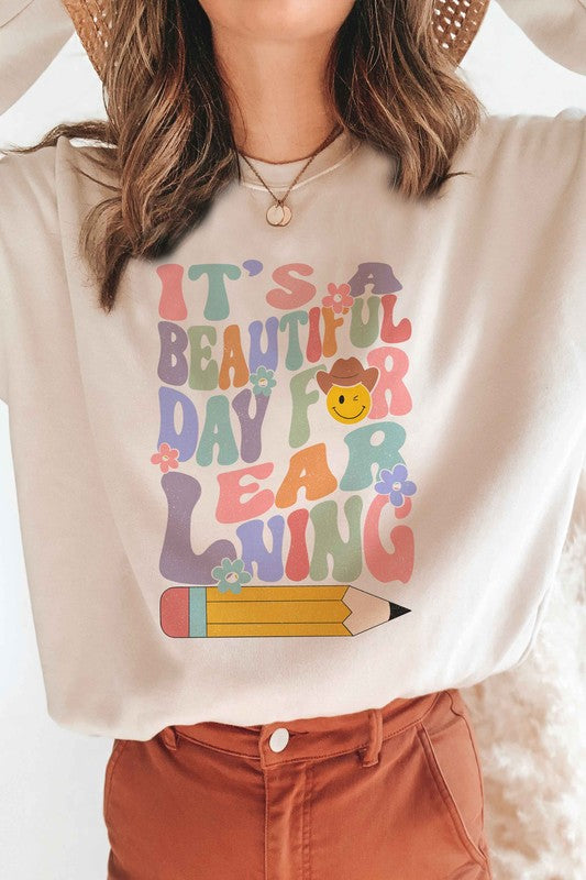 IT'S A BEAUTIFUL DAY FOR LEARNING Graphic Crewneck