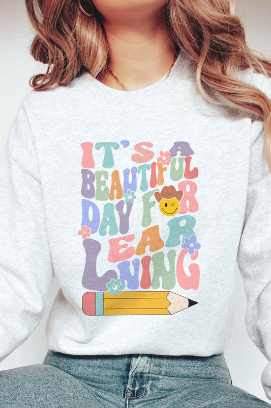 IT'S A BEAUTIFUL DAY FOR LEARNING Graphic Crewneck