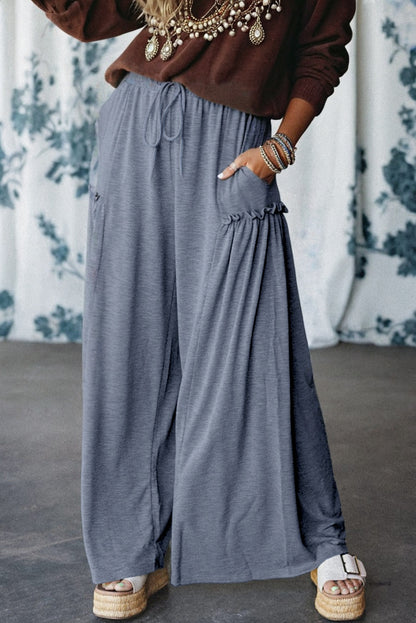 Pantalon ample à taille élastique avec cordon de serrage et détails froncés