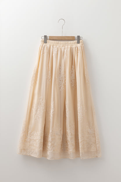 Jupe longue fluide en tulle brodé couleur avoine