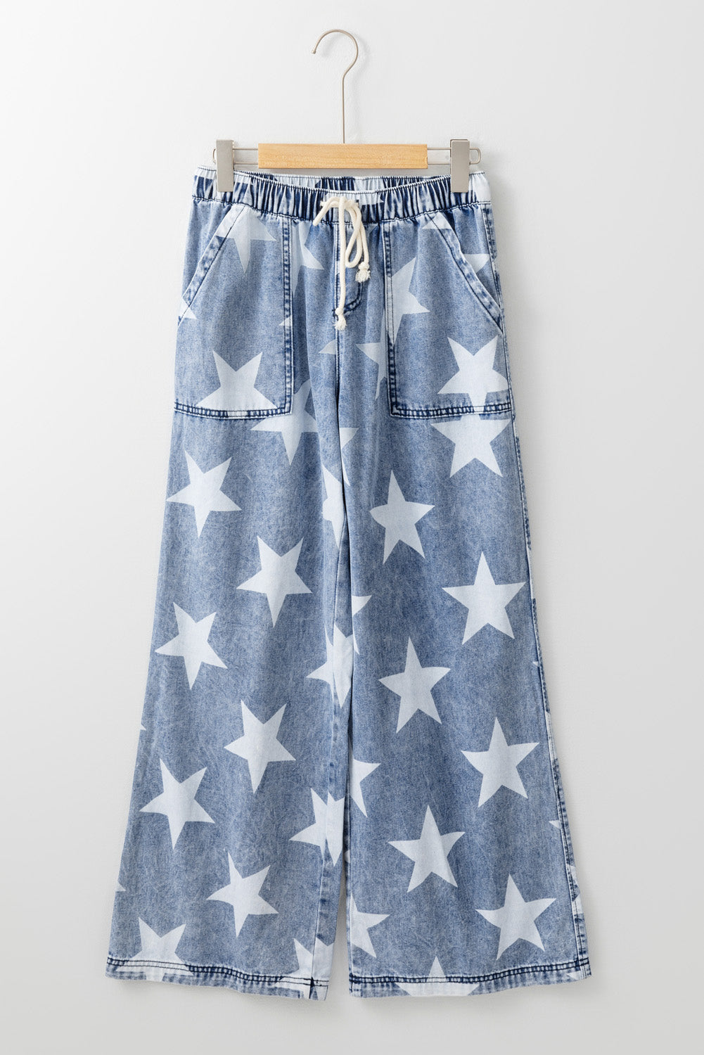 Jean large bleu clair à motif étoile délavé avec cordon de serrage et taille élastique
