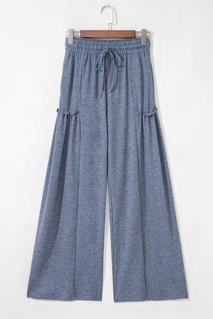 Pantalon ample à taille élastique avec cordon de serrage et détails froncés