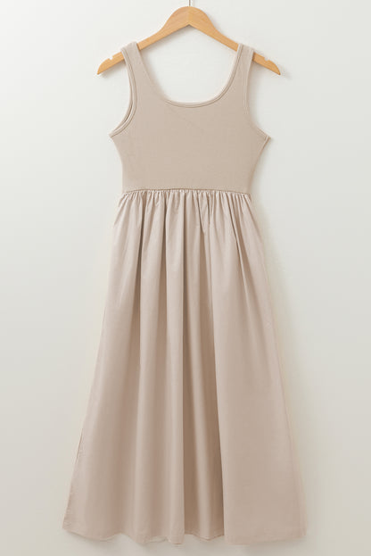 Robe longue plissée sans manches, bustier côtelé, col rond beige