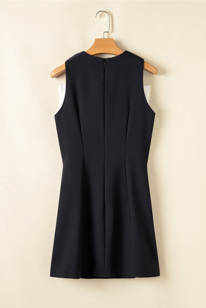 Robe mini sans manches à encolure ronde ornée d'un nœud papillon contrastant noir