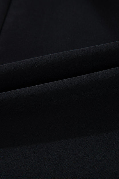 Robe mini sans manches à encolure ronde ornée d'un nœud papillon contrastant noir