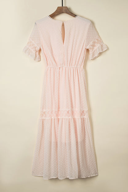Robe longue en plumetis à bordure en dentelle