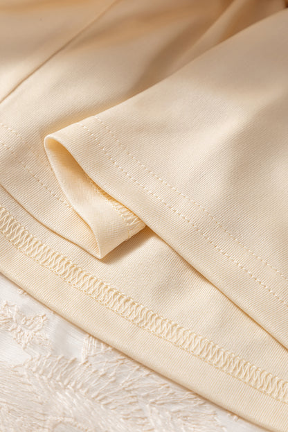 Jupe longue fluide en tulle brodé couleur avoine