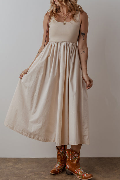 Robe longue plissée sans manches, bustier côtelé, col rond beige