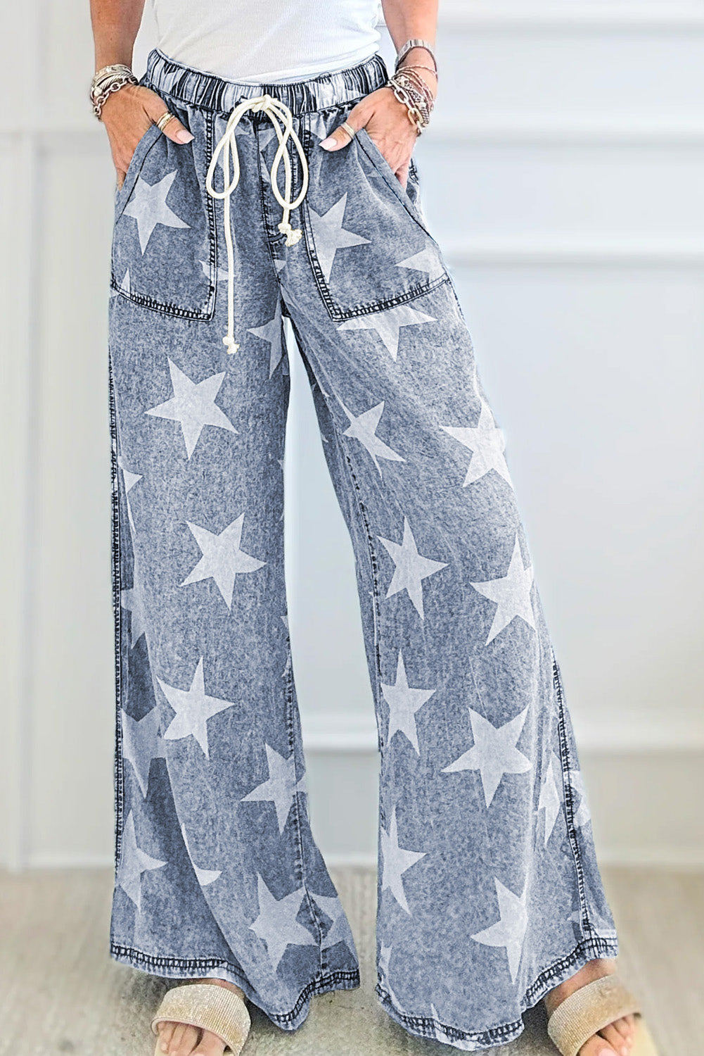 Jean large bleu clair à motif étoile délavé avec cordon de serrage et taille élastique